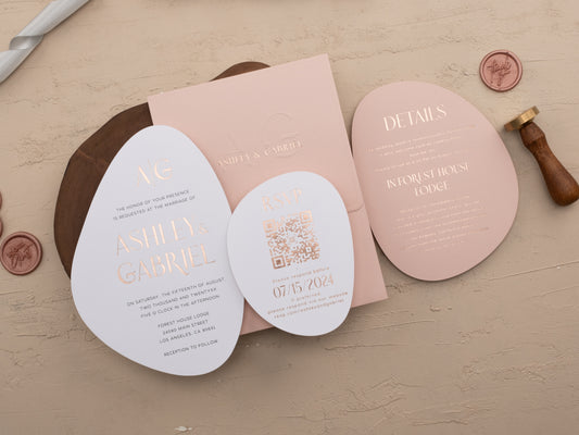 Full wedding stationery set with coordinating blush pink elements and QR code RSVP card