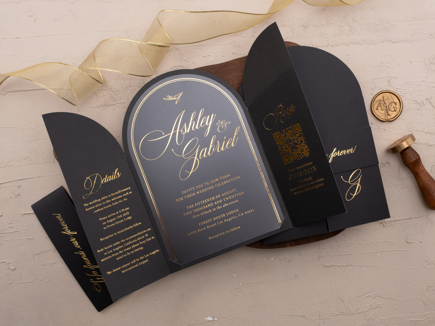 Black arched invitation suite with gold print on textured cardstock