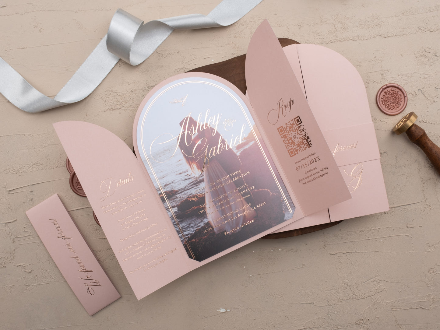 Blush pink arch folded acrylic wedding invitation with rose gold foil and matching RSVP card, styled with Couple Photo