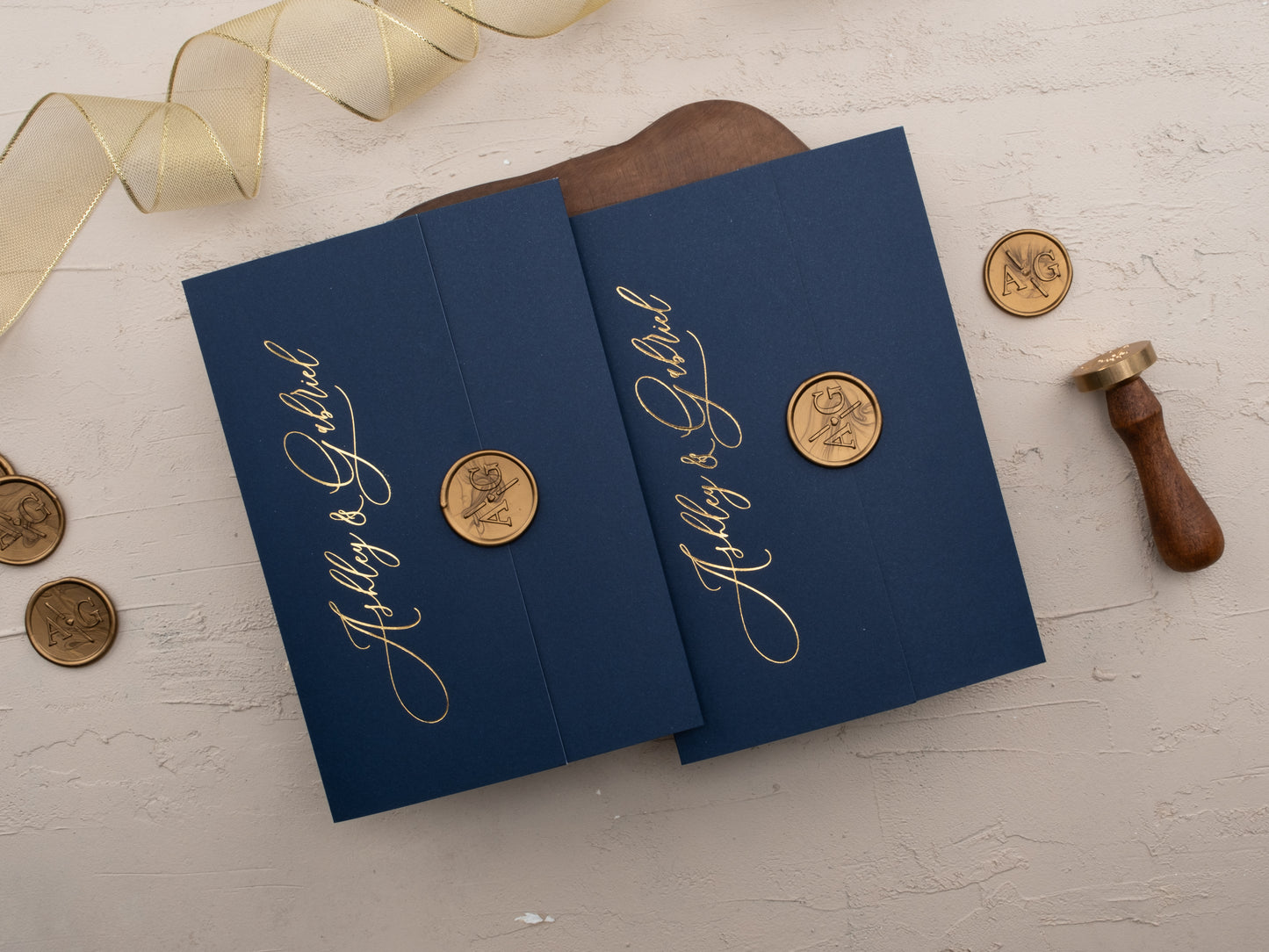 Navy wedding invite with and gold calligraphy