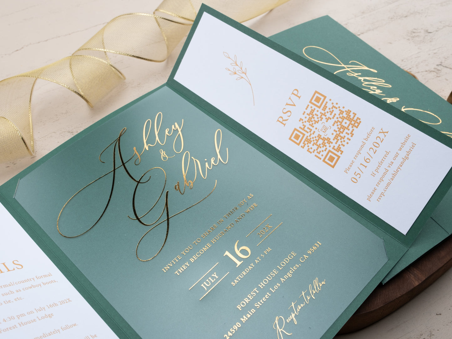 Close-up of luxurious gold script on green wedding invitation