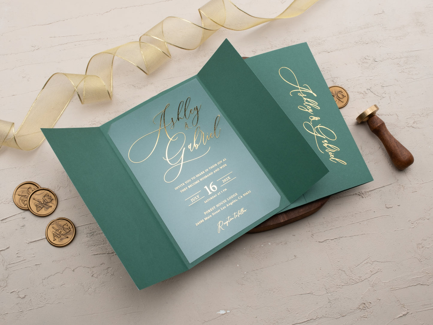 Luxury tri-fold emerald green invitation with gold foil text