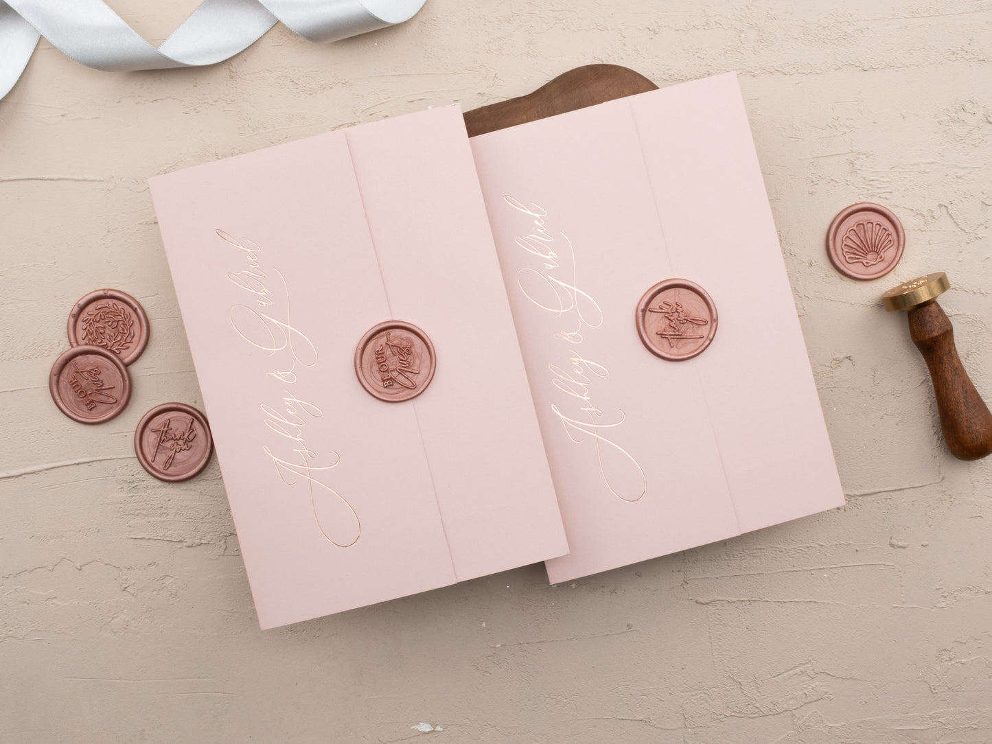 Luxury tri-fold blush invitation with wax seal