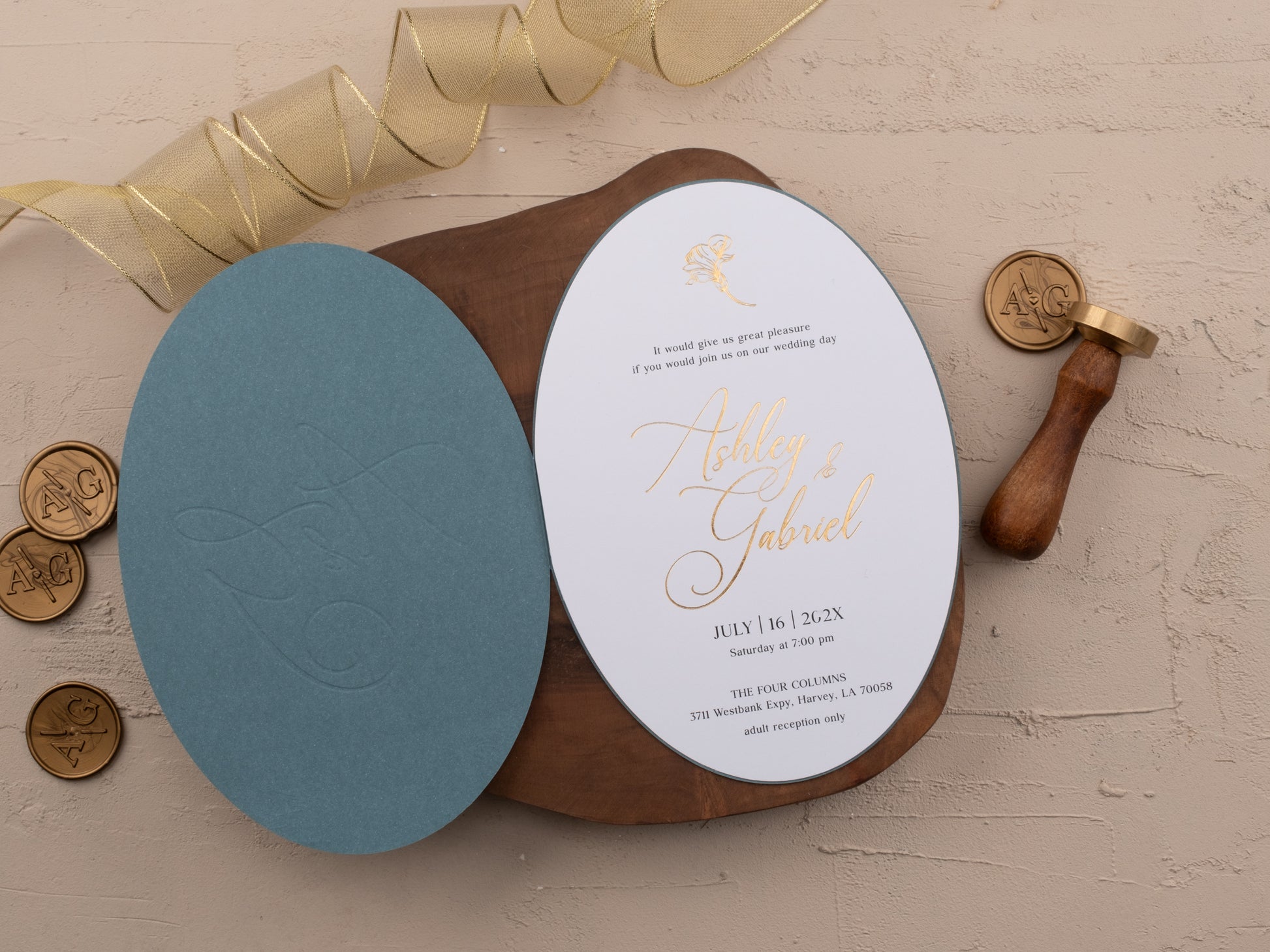Complete dusty blue and gold invitation set with RSVP and details card inside