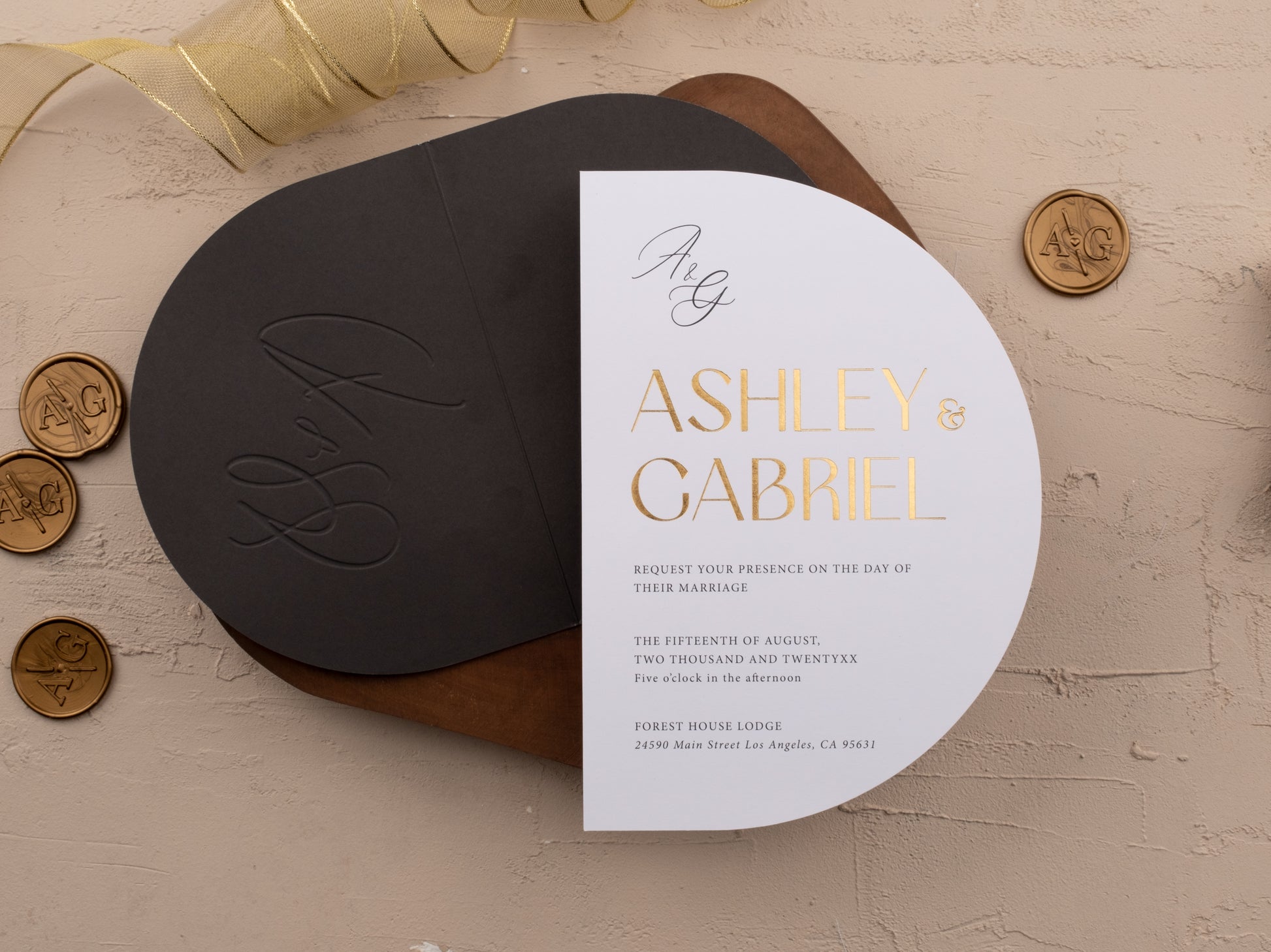 Black and gold wedding invitation with modern arch design, gold foil print