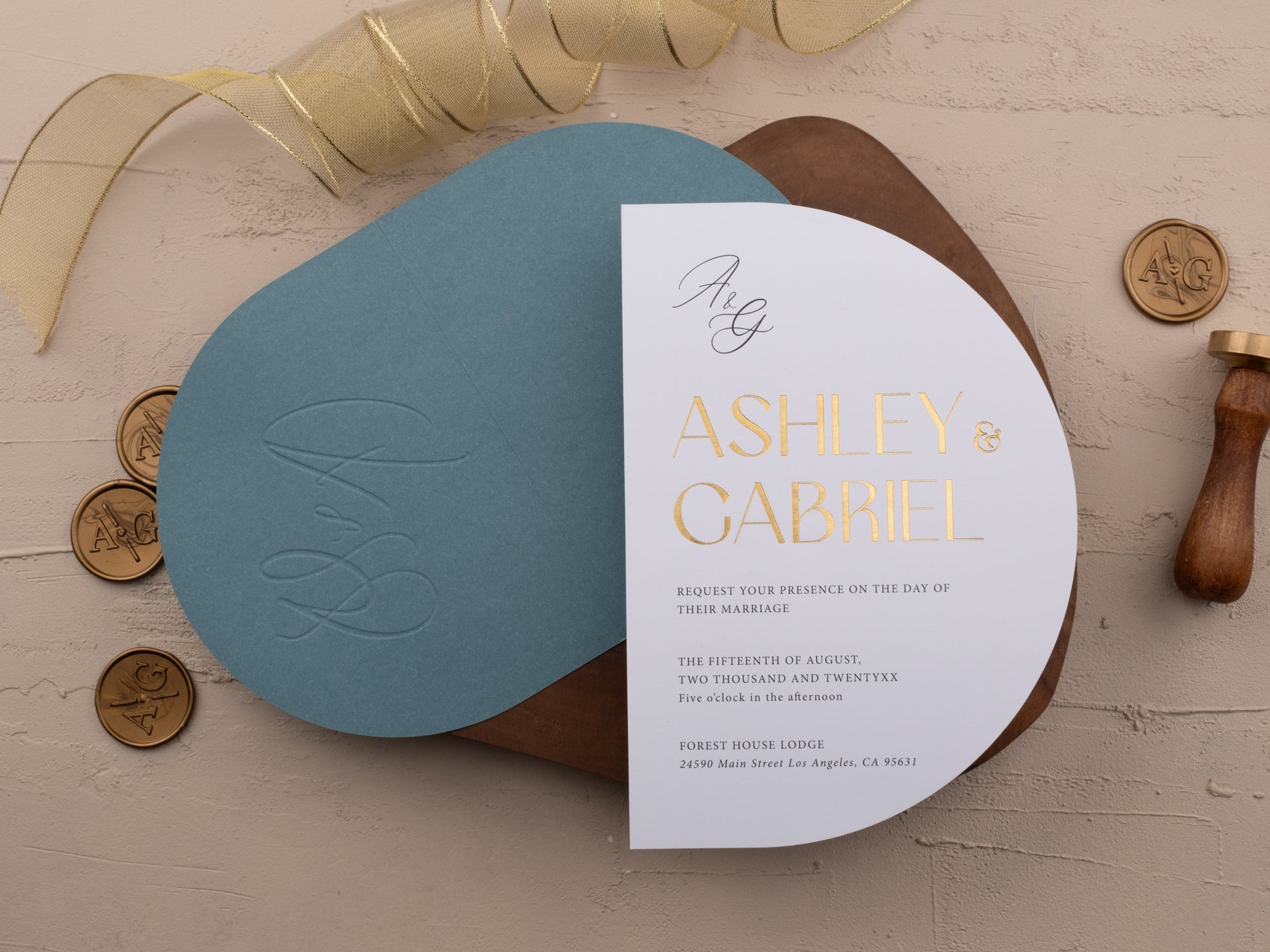 Dusty blue wedding invitation with gold foil print
