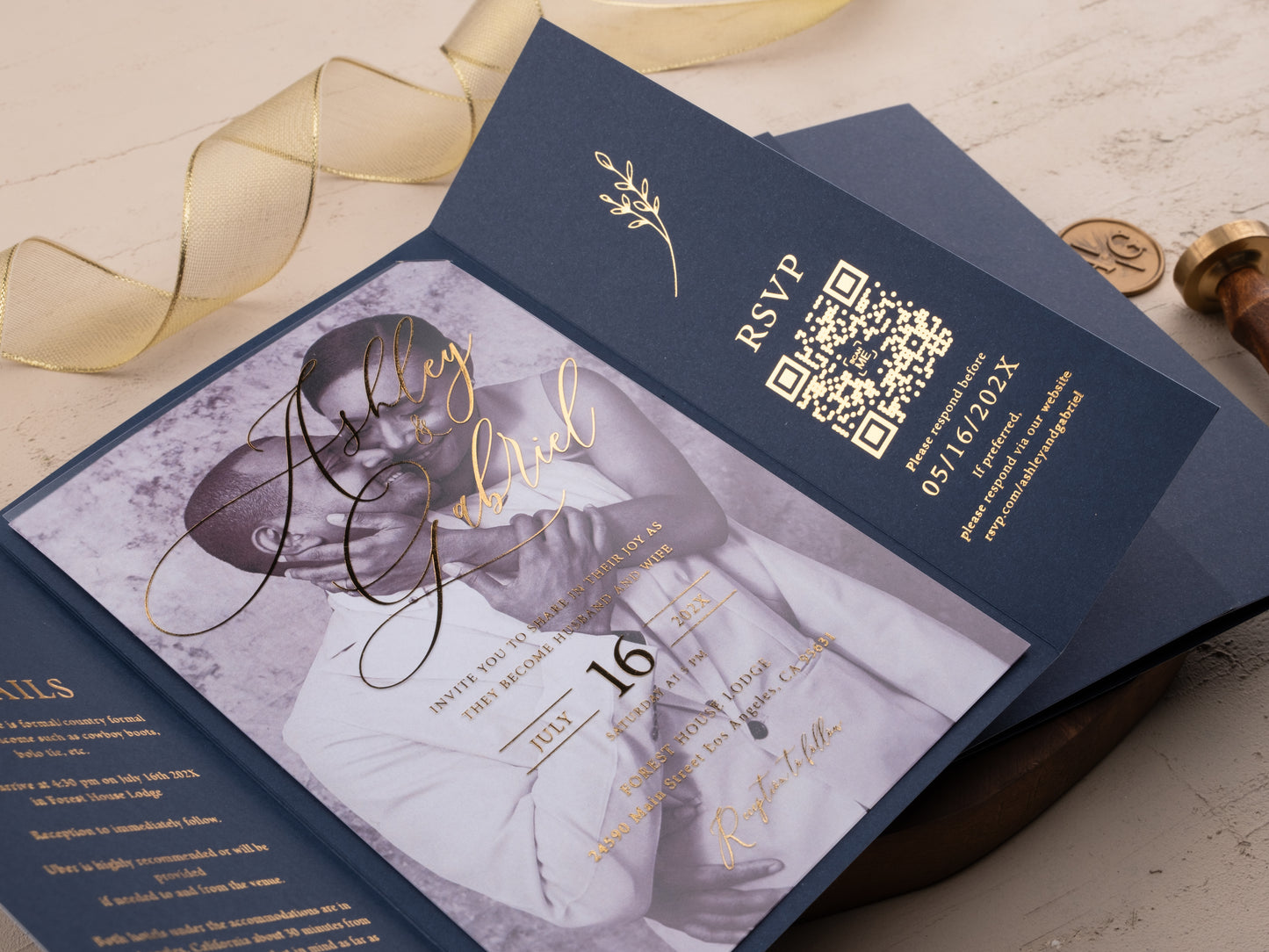 Elegant navy wedding invite with acrylic insert and gold calligraphy