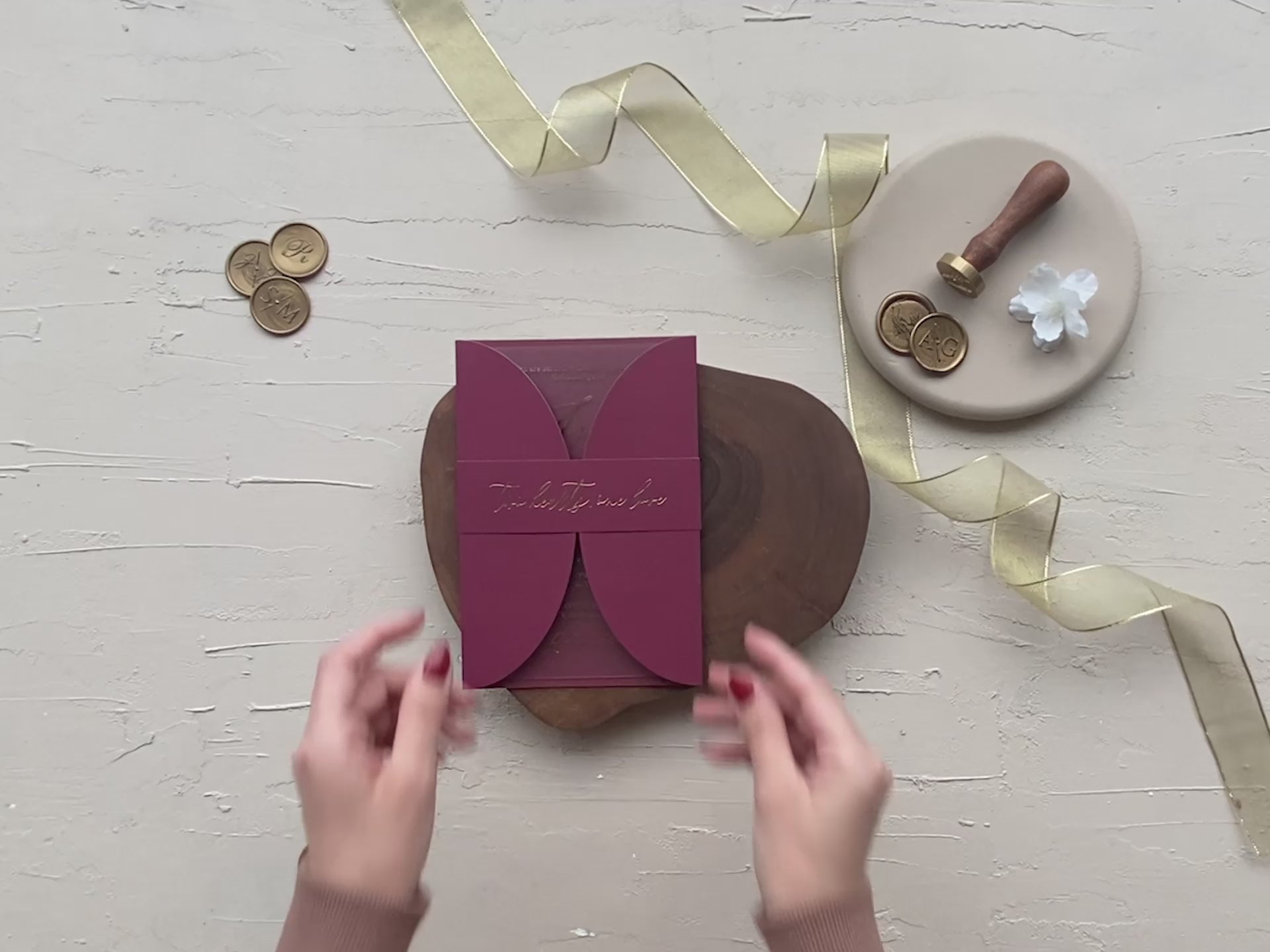 Burgundy acrylic wedding invitation with gold foil, RSVP QR panel, curved jacket, and photo insert for romantic weddings.