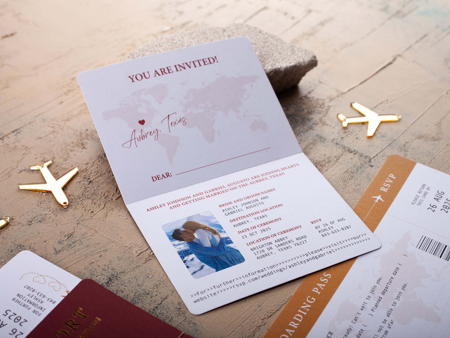 Burgundy and gold passport wedding invitation with customizable photo for destination wedding, featuring boarding pass design.