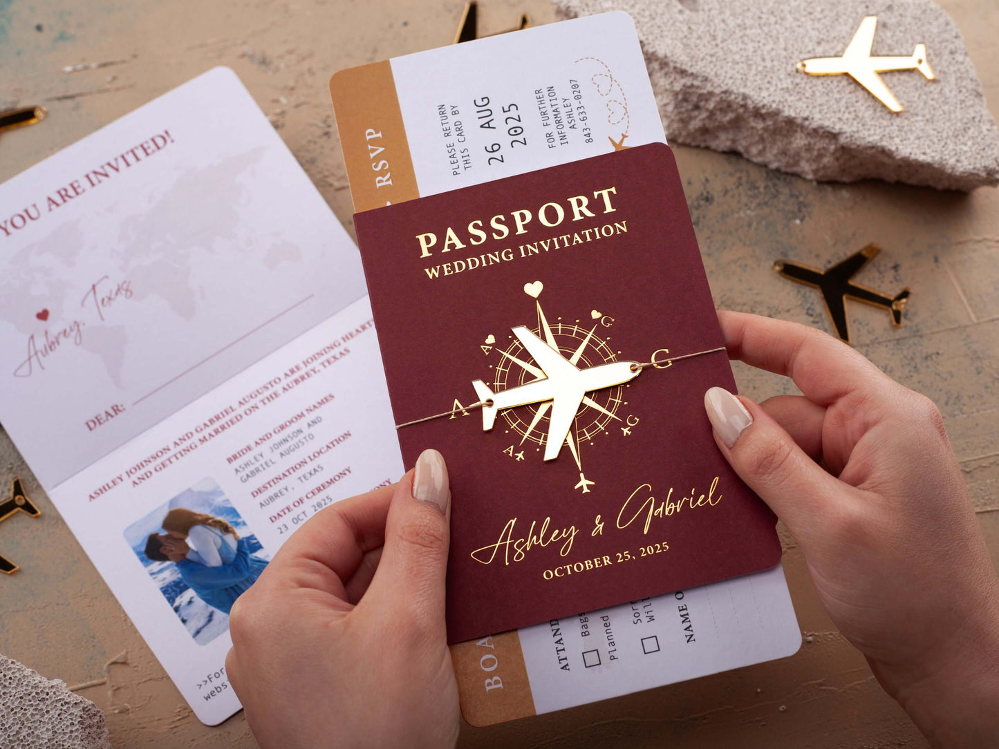 Burgundy and gold passport wedding invitation with airplane theme for destination wedding, featuring customizable photo and date.