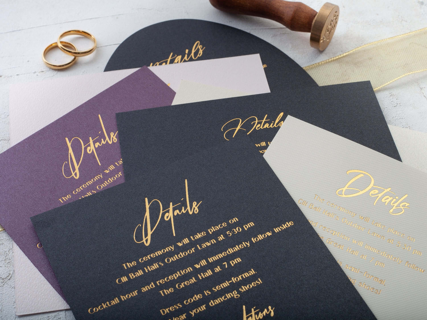 Assorted wedding details cards in various styles and finishes