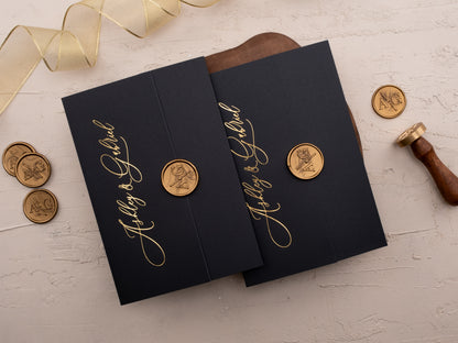 Black and gold tri-fold wedding invitation with formal event info