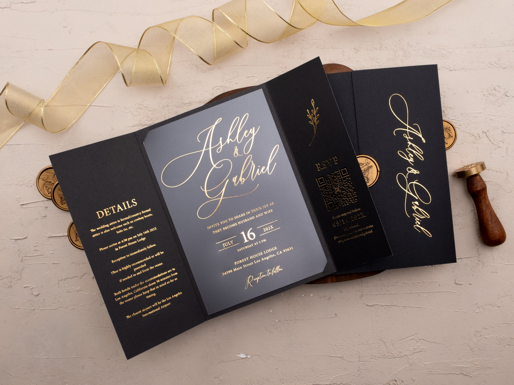 Closed black wedding invitation with gold foil names and custom wax seal