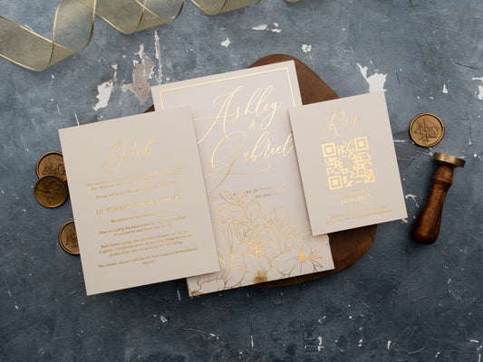 Cream and gold acrylic wedding invitation with floral sleeve jacket