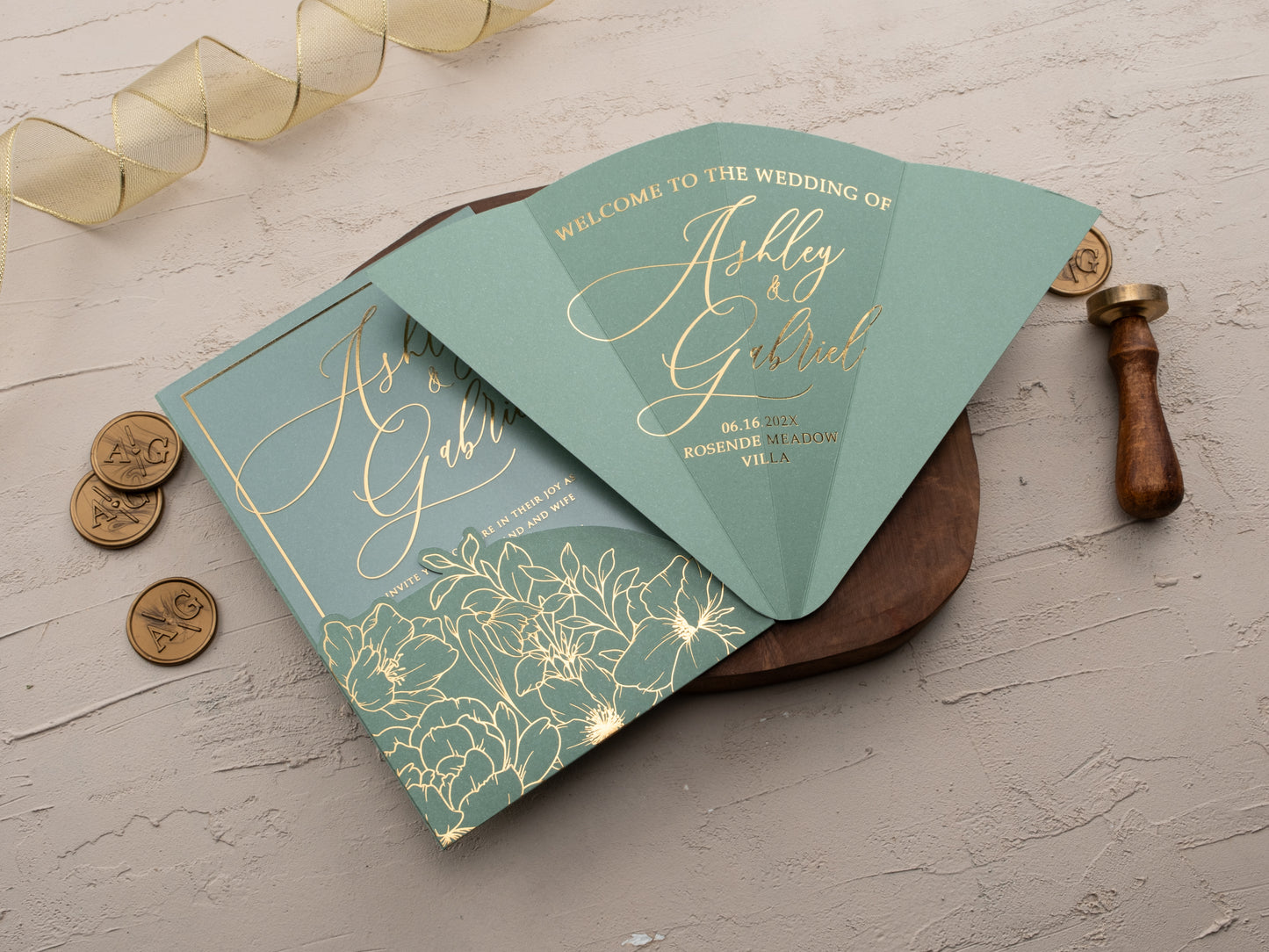 Acrylic wedding invitation with gold foil floral design and matching sage envelope and Hand Fan